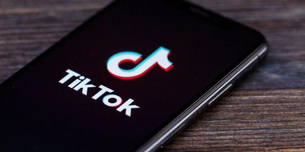 Phone with TikTok emblem on screen