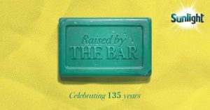 Local community members sharing stories and memories at a Sunlight Raised by the Bar live event in South Africa.