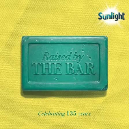 Sunlight Green Bar Raised by the Bar truck activated at a Durban taxi rank to celebrate 135 years with community storytelling and trader support.