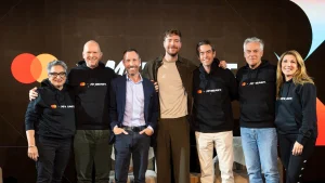 Mastercard and Beast Industries leadership representatives pictured together during a company event